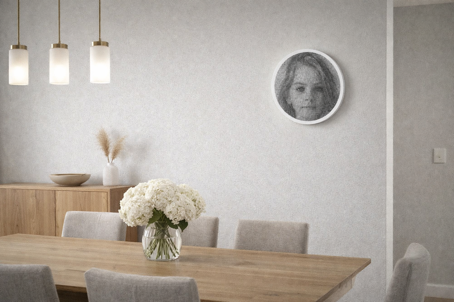 Minimalist dining room with round string art portrait on wall
